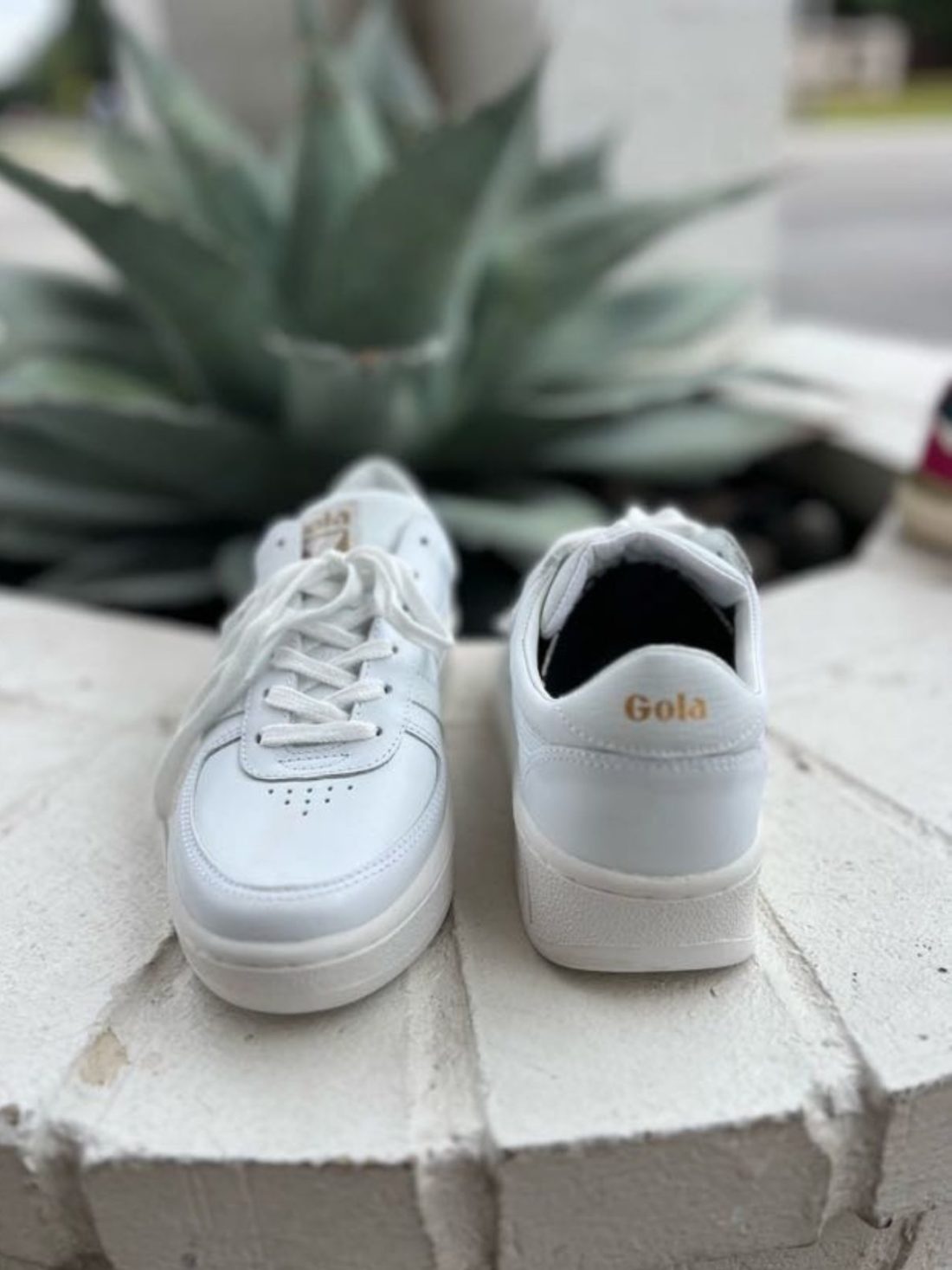 gola grandslam leather sneaker in white/white/white