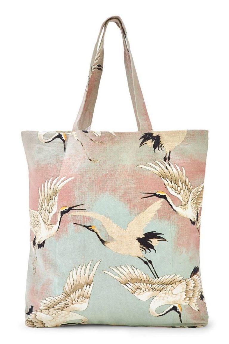 one hundred stars cotton canvas tote in aqua heron